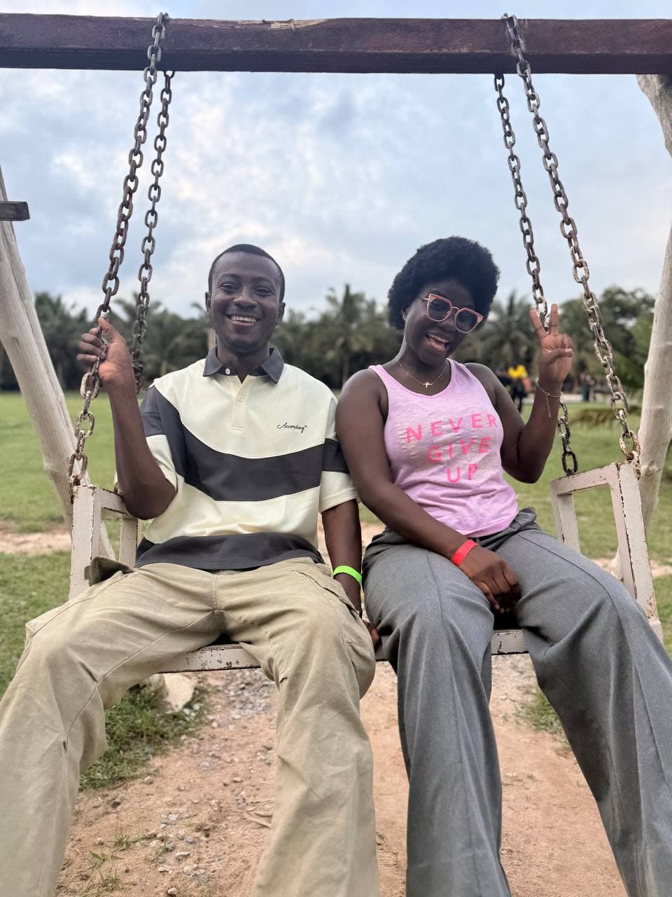 Guests sharing a laugh on a garden swing