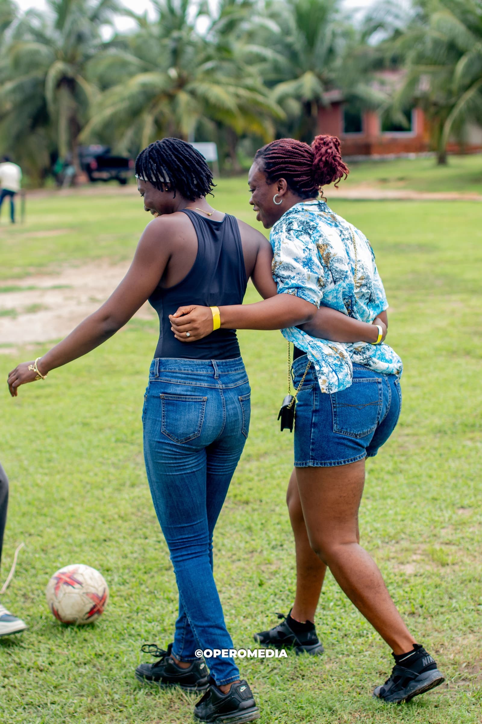 Guests dancing together in the open field